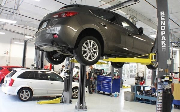 BendPak-Two-Post-Lifts-Automotiv.jpg Bendpak XPR-10AS 2 post hoists 10,000 lbs / Asymmetric Clearfloor / Adjustable Width / Screw Pads