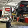 Low-Ceiling-Two-Post-Lift-Automo.webp Bendpak XPR-9S two post lifts 9,000 lbs / Floorplate / Chain-Over / Short Lift / Screw Pads